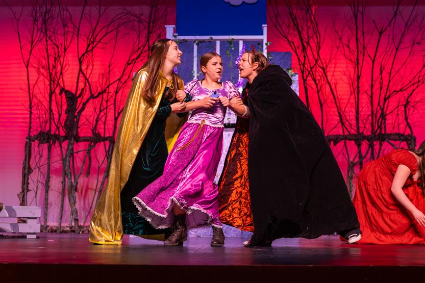 Students perform onstage
